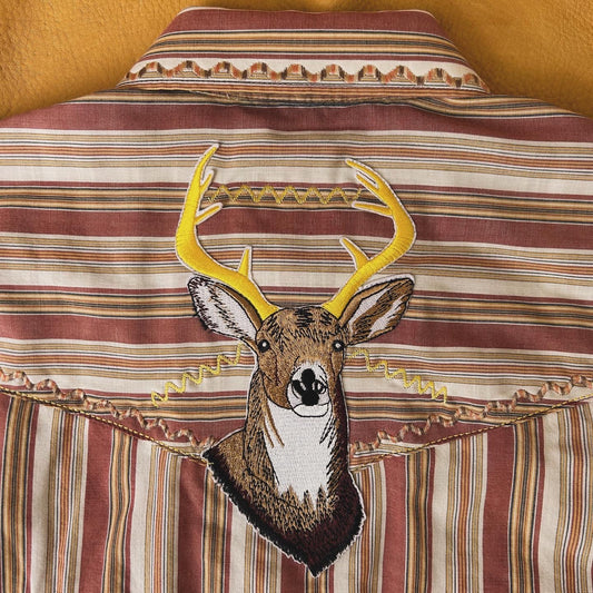 staring deer on vintage stripe. lg.